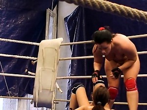 Lesbian domina wrestling with pretty babe